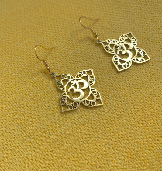 Golden Om dangling earrings